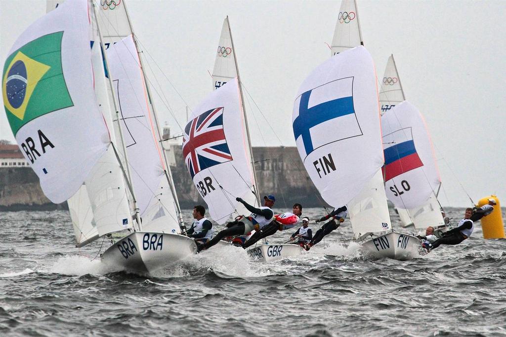 The pack chase hard approaching the finish of race 1 in the Mens 470 © Richard Gladwell www.photosport.co.nz